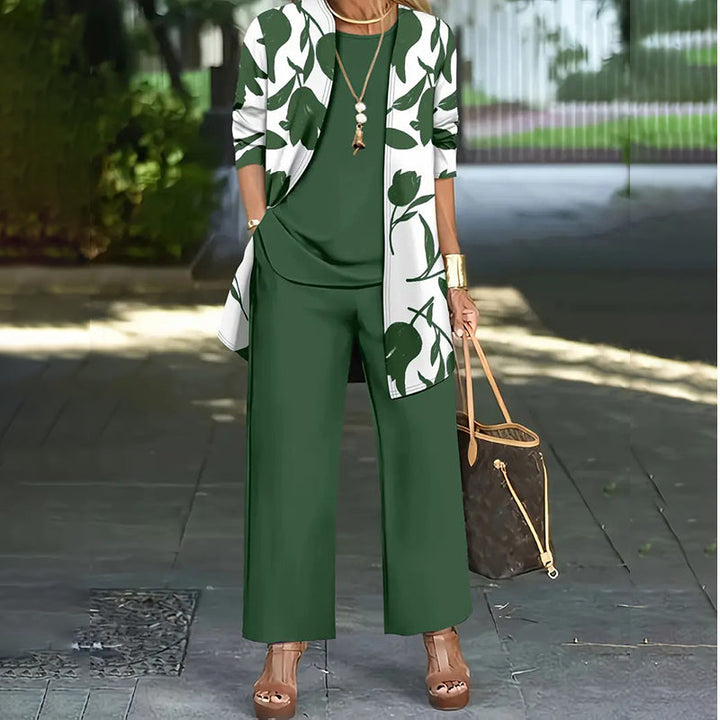Conjunto de tres piezas de poliéster para mujer. Chaqueta floral, pantalón recto. Ideal para moda de otoño.