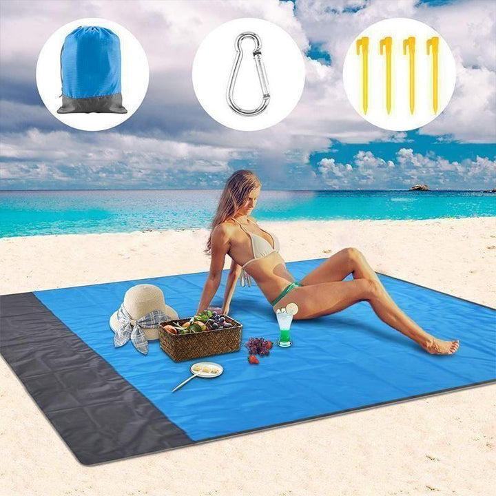 Manta de playa anti-arena, impermeable y portátil para picnic familiar o camping exterior.