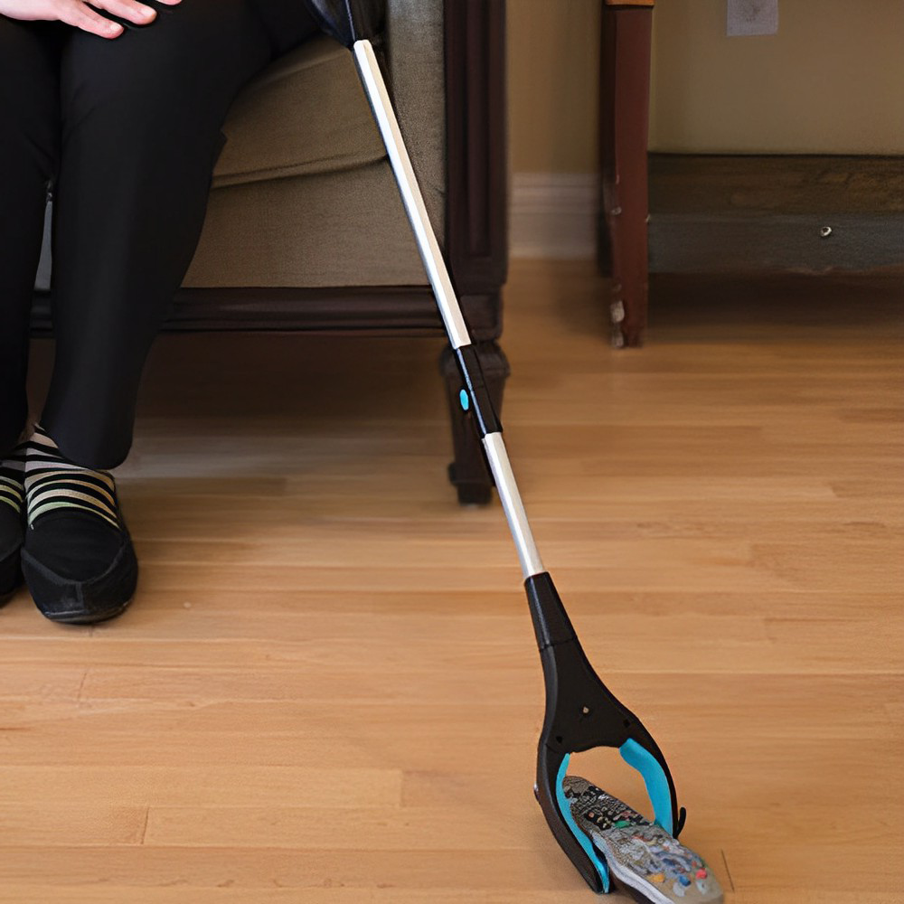 Herramienta de agarre portátil y plegable con alcance extendido para recoger objetos fácilmente.