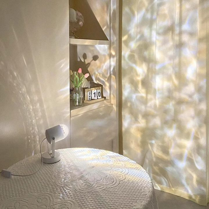 Lámpara de mesa moderna con luz RGB dinámica, ideal para sala de estar.