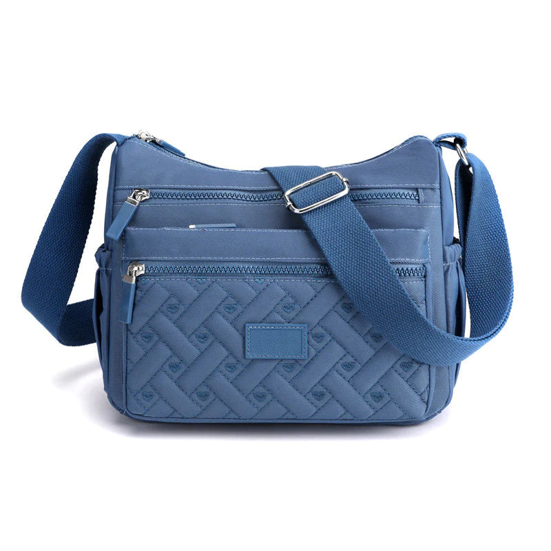 Bolso de mujer estilo clásico, perfecto para combinar con cualquier atuendo diario o de oficina.