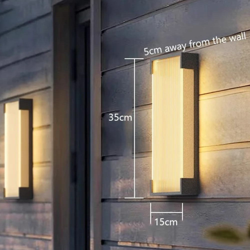 Aplique LED de acero inoxidable, IP65, eficiencia energética para zonas exteriores.