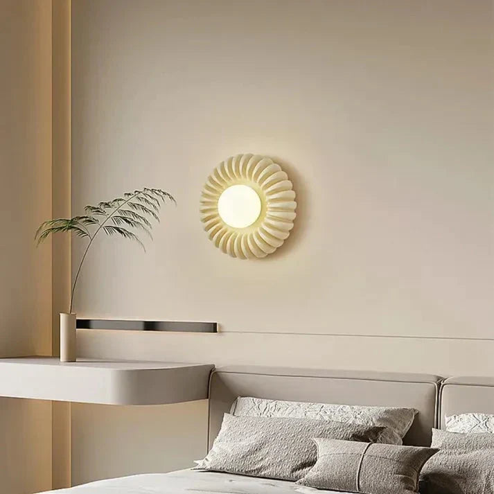 Aplique LED moderno y redondo para pared, optimiza la iluminación del dormitorio.