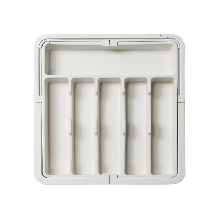 Organizador de cajón extensible y ajustable para un almacenamiento eficiente en cocina y oficina.