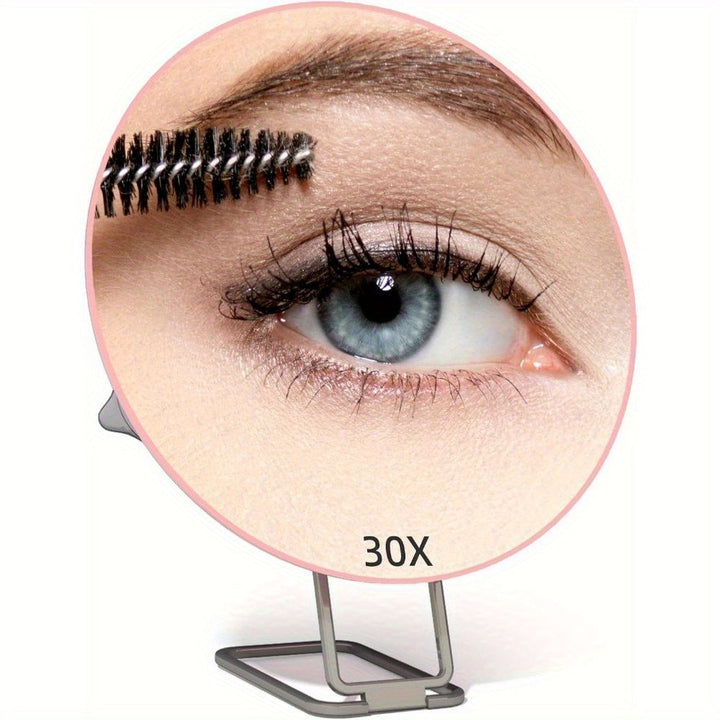 Espejo de aumento 10x para aplicar maquillaje con precisión, portátil con ventosa para cualquier superficie.