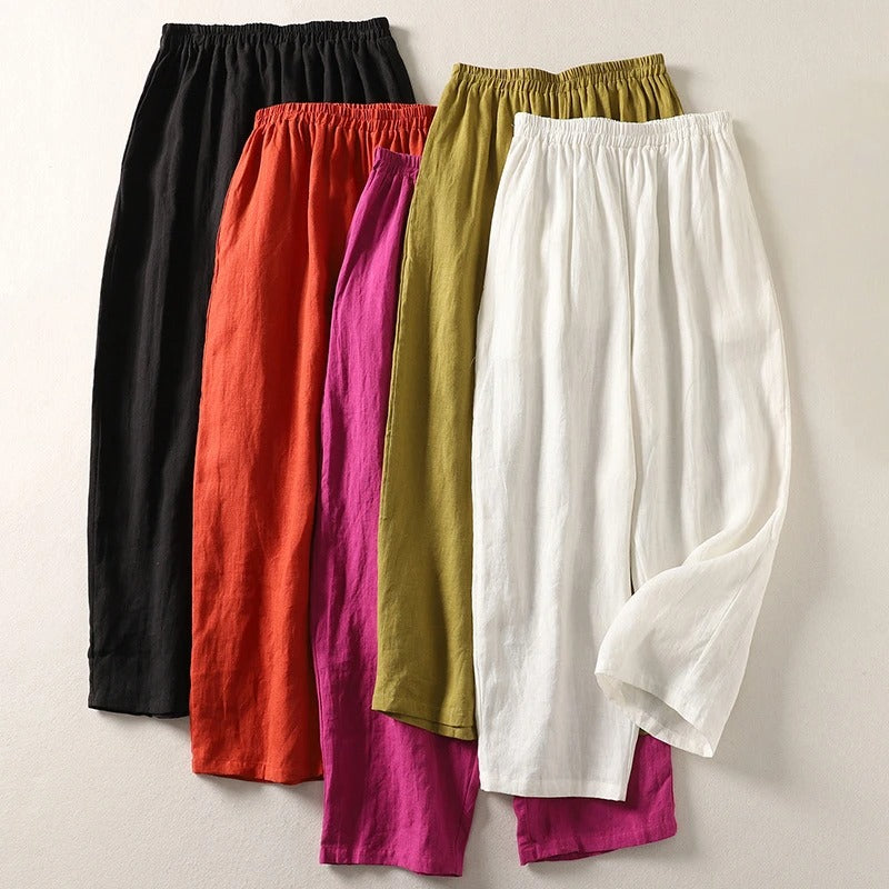 Pantalones casuales de mujer en lino algodón, cintura elástica. Estilo fluido, ideal para viajar o ropa de playa.