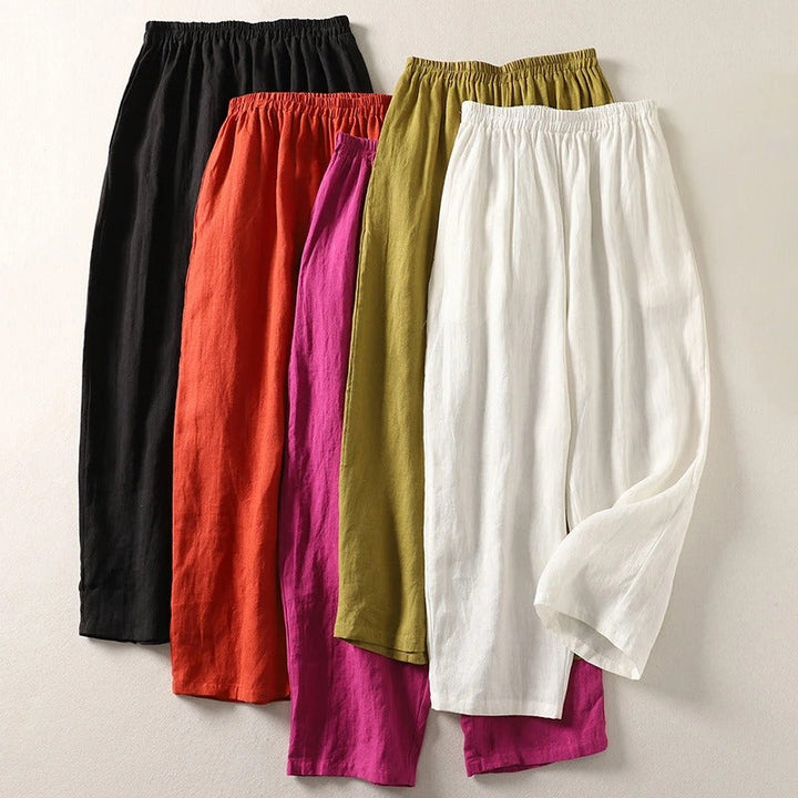 Pantalones casuales de mujer en lino algodón, cintura elástica. Estilo fluido, ideal para viajar o ropa de playa.