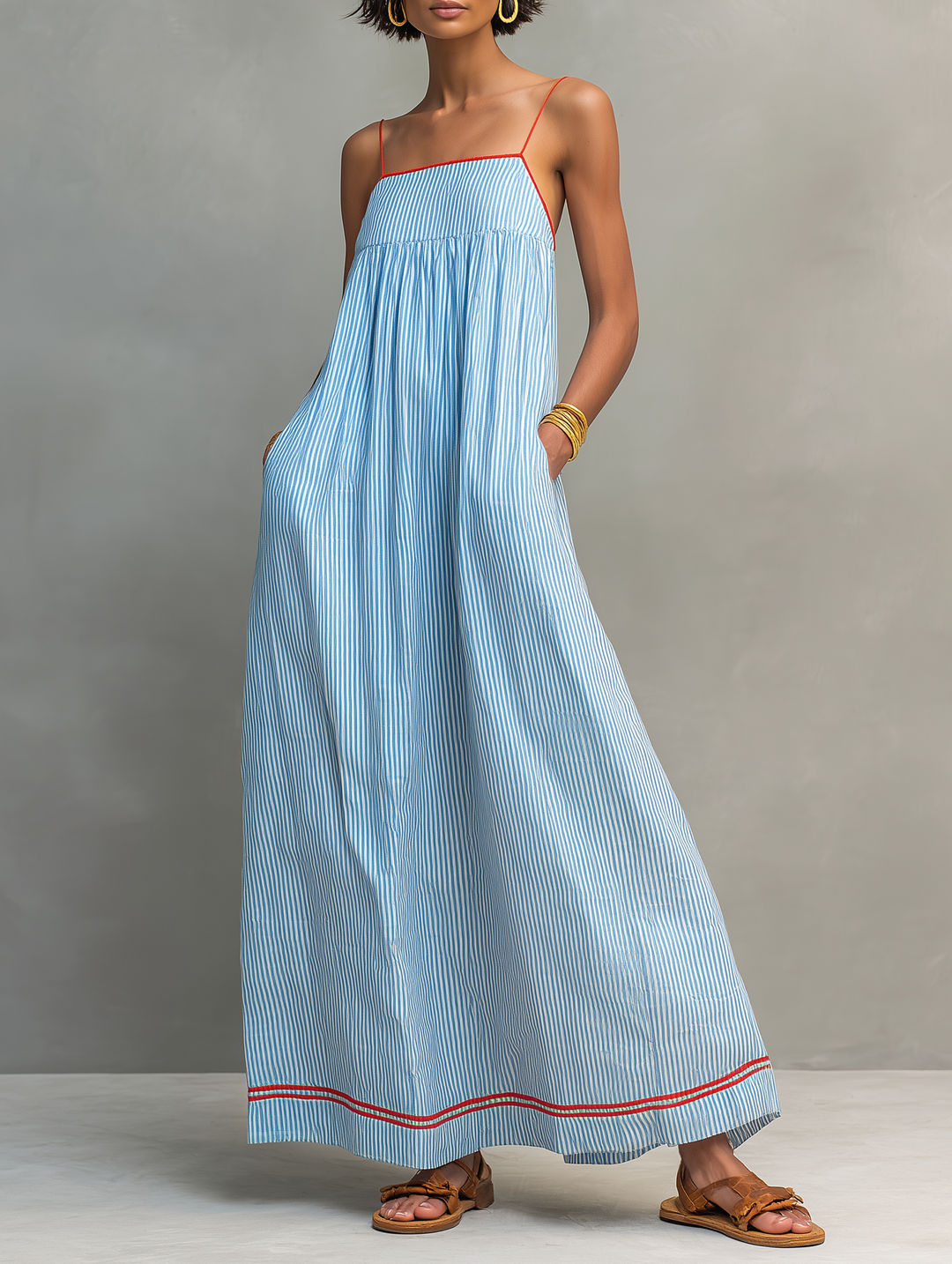 Elegante vestido de rayas para mujer, corte maxi. Ideal para paseos de verano o eventos casuales y frescos.