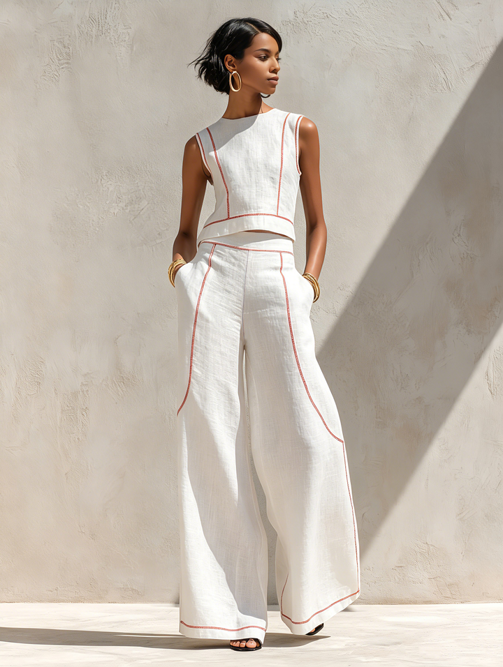 Moda femenina versátil: conjunto de top sin mangas y pantalón ancho fluido, elegante y cómodo para viajes.
