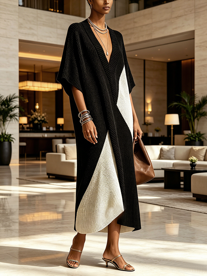 Vestido midi fluido bicolor para mujer con escote en V. Prenda versátil para un look casual o formal.