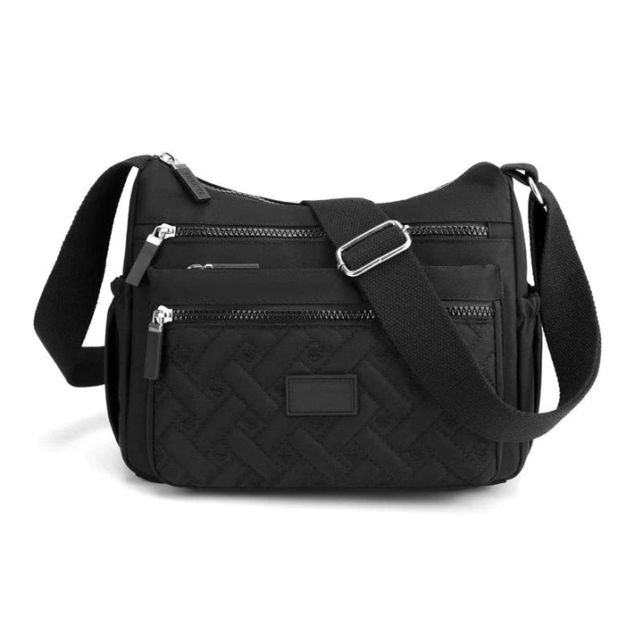 Accesorio chic: bolso de hombro para mujer, ideal para un estilo sofisticado y versátil.