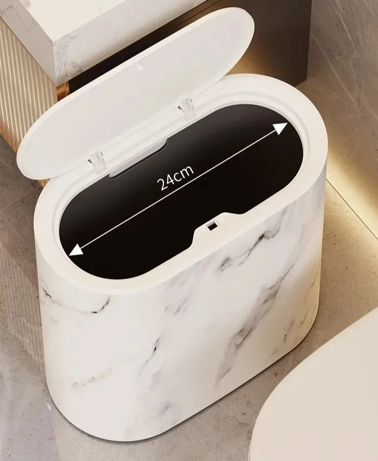 Cesto de basura de plástico blanco con vetas de mármol gris, diseño nórdico para espacios modernos.