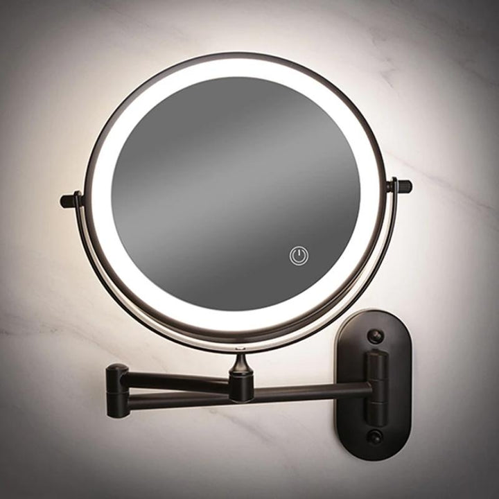 Espejo de baño moderno negro con luz LED y aumento, perfecto para rutinas de belleza y cuidado facial.
