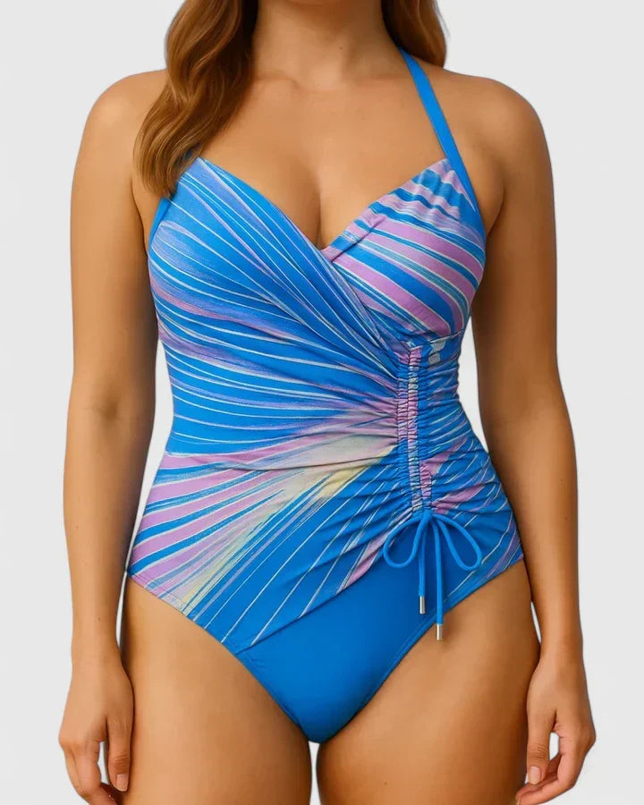 Bañador de mujer cómodo con rayas, escote V y diseño moldeador. Ideal para un verano con estilo en playa.