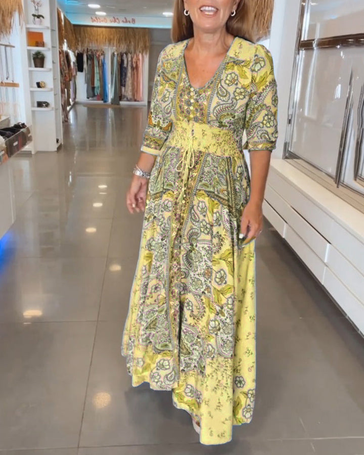 Vestido de vacaciones bohemio, fluido, con estampado vibrante y cintura ajustable para mujer.