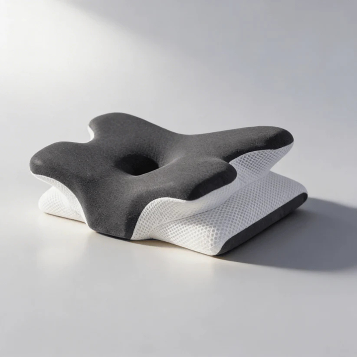 Almohada cervical ergonómica ajustable viscoelástica. Alivia dolor de cuello, mejora el descanso y soporte al dormir.