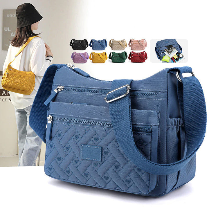 Elegante bolso de hombro para mujer, accesorio versátil que complementa cualquier estilo chic.