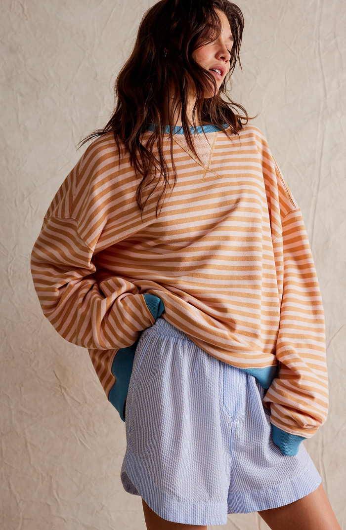 Suéter casual de otoño-invierno, oversize, rayas vibrantes multicolor para mujer.