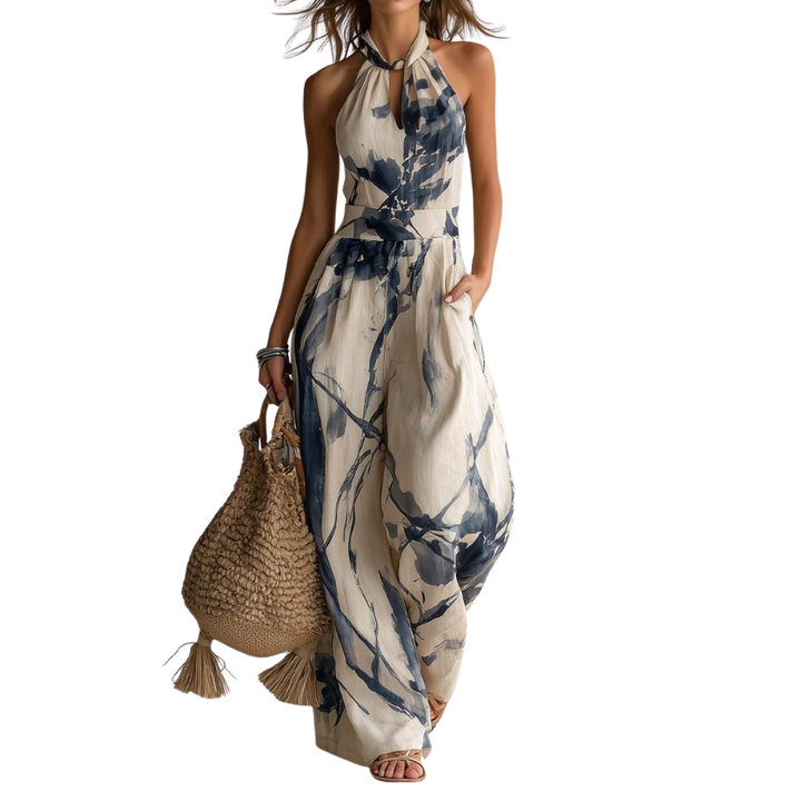 Mono halter artístico para mujer, estampado único. Diseño elegante de piernas anchas, ideal para verano y ocasiones especiales.