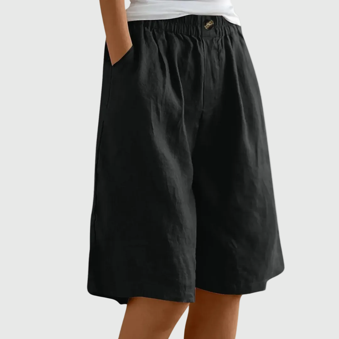 Pantalones cortos de mujer fluidos con cintura elástica y prácticos bolsillos. Perfectos para el verano.