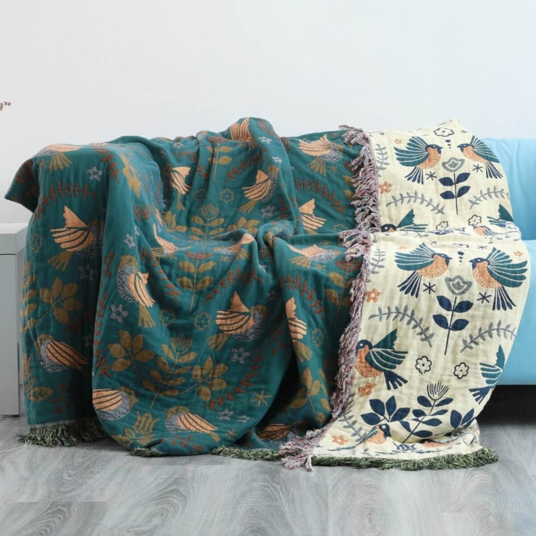 Manta de hogar versátil, reversible, estilo escandinavo con diseño de pájaros, 100% algodón para máximo confort.