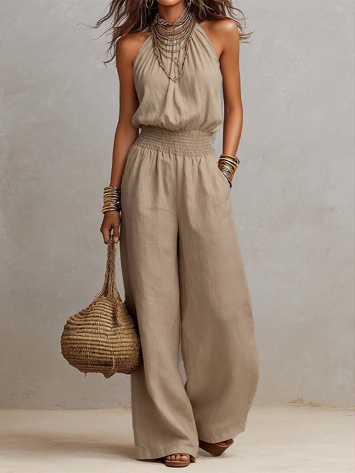 Mono mujer boho chic halter con pierna ancha y espalda descubierta. Perfecto para la playa de verano.