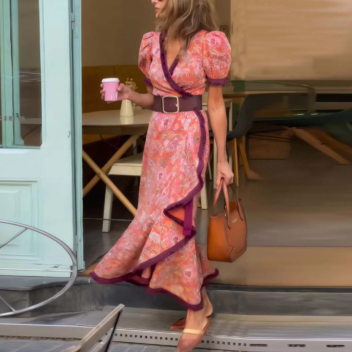 Vestido envolvente de mujer con elegantes mangas abullonadas y detalles de ondas, ideal para fiesta o verano.