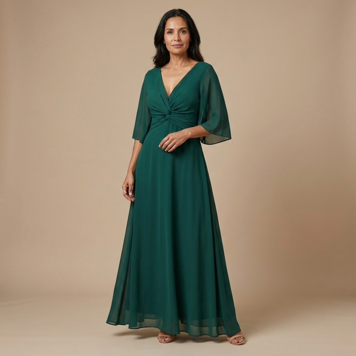 Vestido largo elegante para mujer, escote V estilizado, fluido, ideal fiesta o ceremonia. Moda primavera-verano.