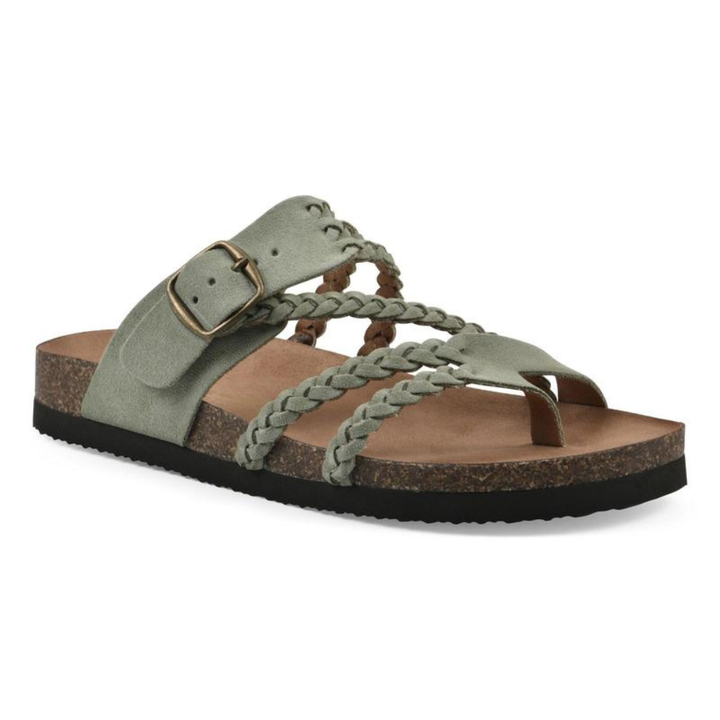Detalle de sandalias trenzadas femeninas. Diseño moderno y ajustable, perfecto para el calzado veraniego.