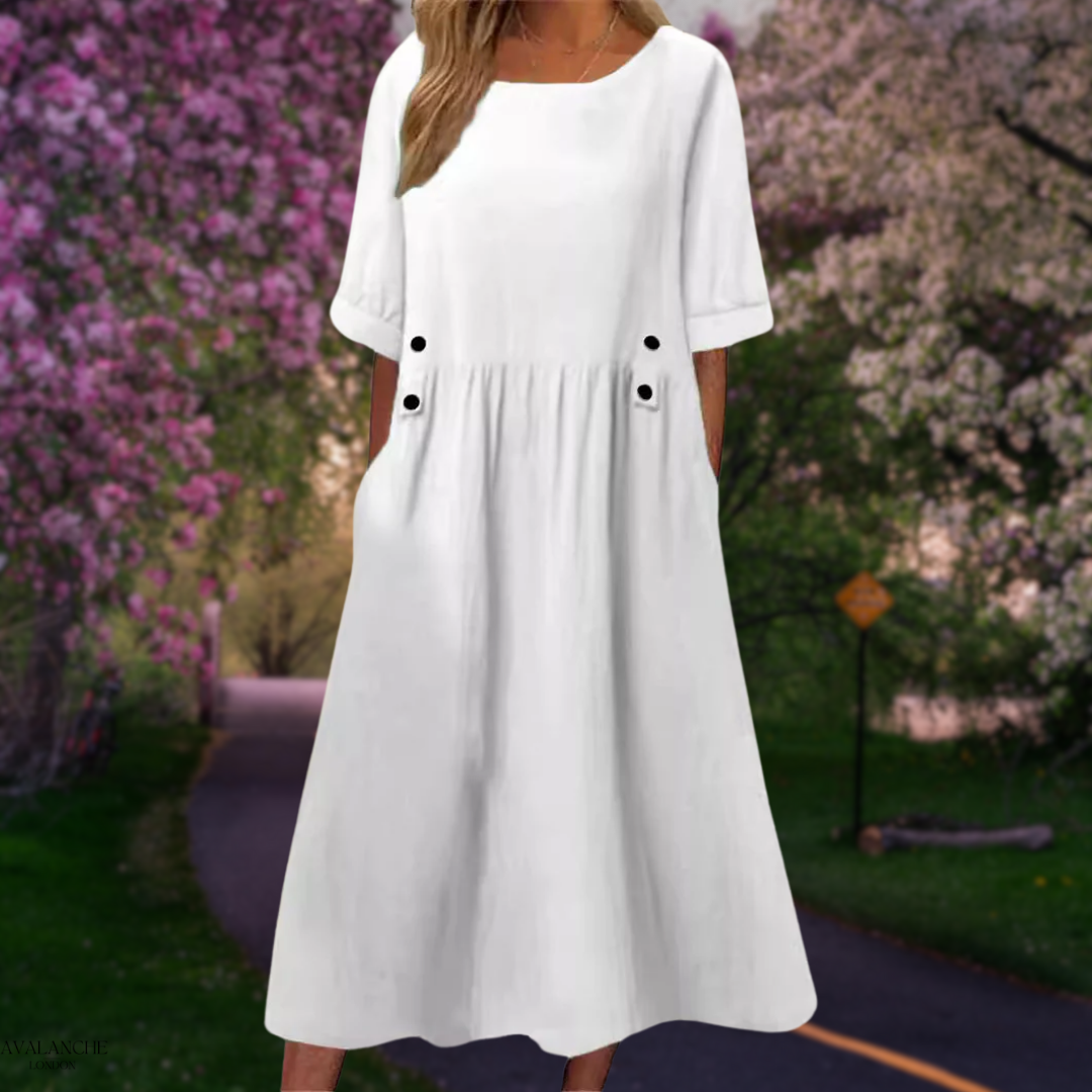 Vestido midi fluido de verano para mujer, cómodo y elegante para un look casual o de playa.