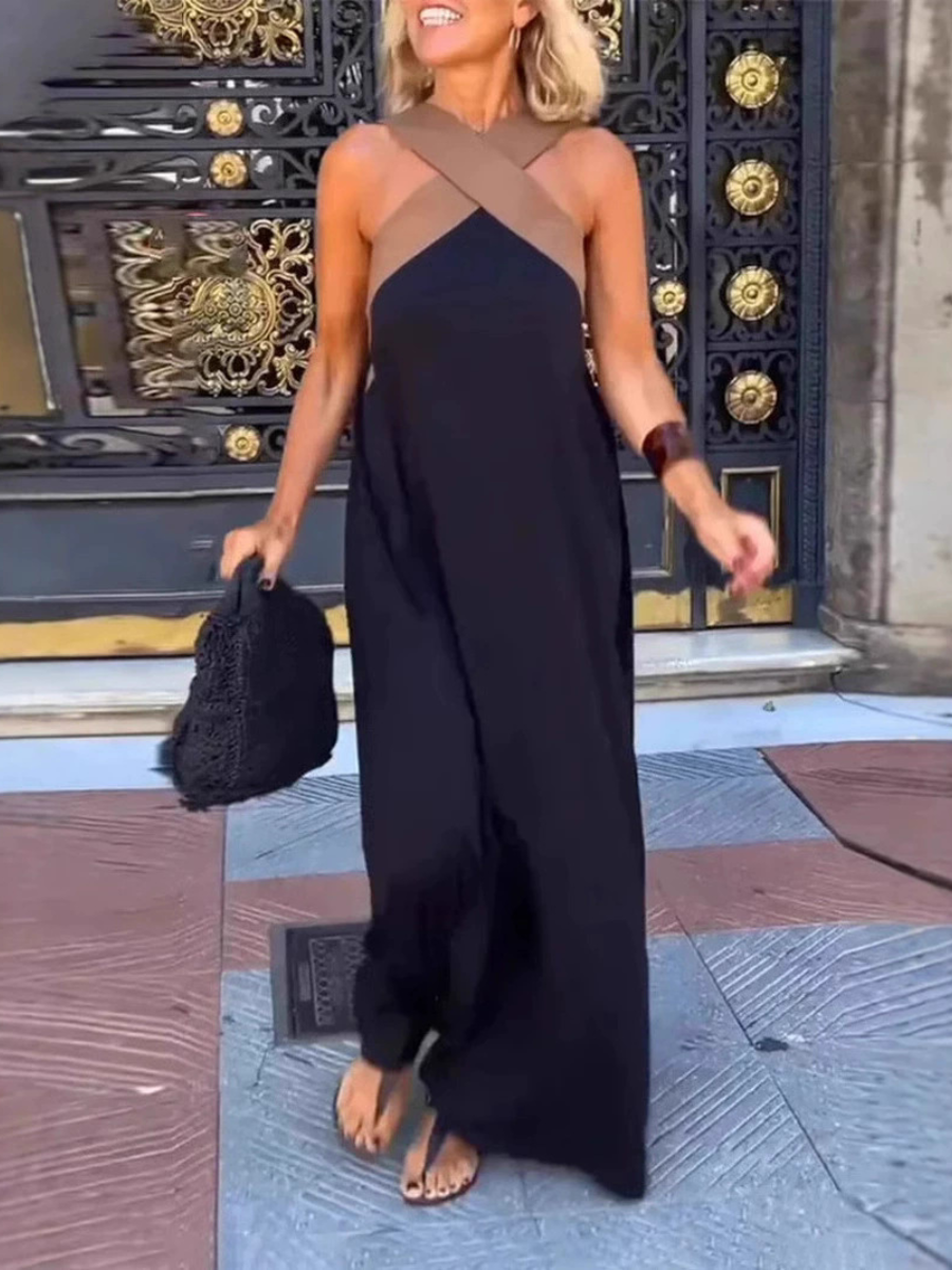Vestido largo elegante de mujer, ideal para invitada de boda o fiesta, con tejido fluido y femenino.