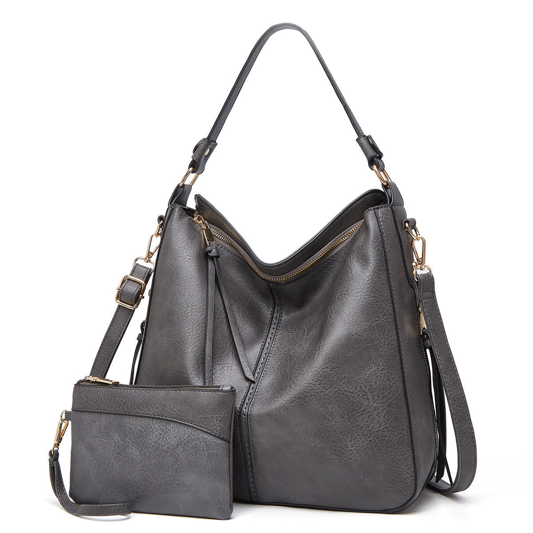 Bolsos de mujer versátiles, set de bandolera y muñequera en elegante piel sintética, casual.