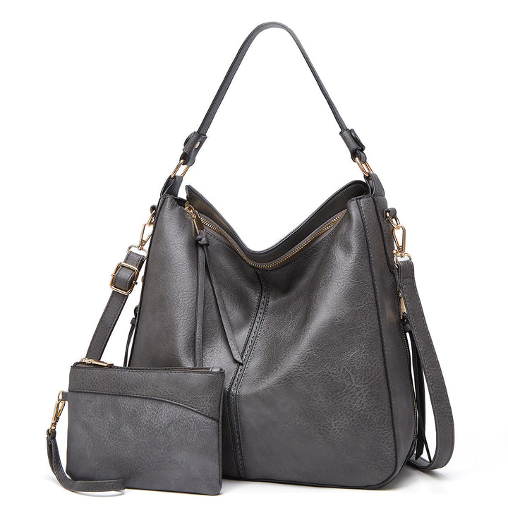 Bolsos de mujer versátiles, set de bandolera y muñequera en elegante piel sintética, casual.
