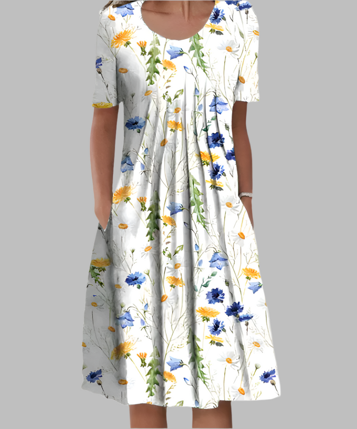 Vestido maxi fluido y cómodo para mujer, estampado floral elegante y escote V. Perfecto para looks casuales.