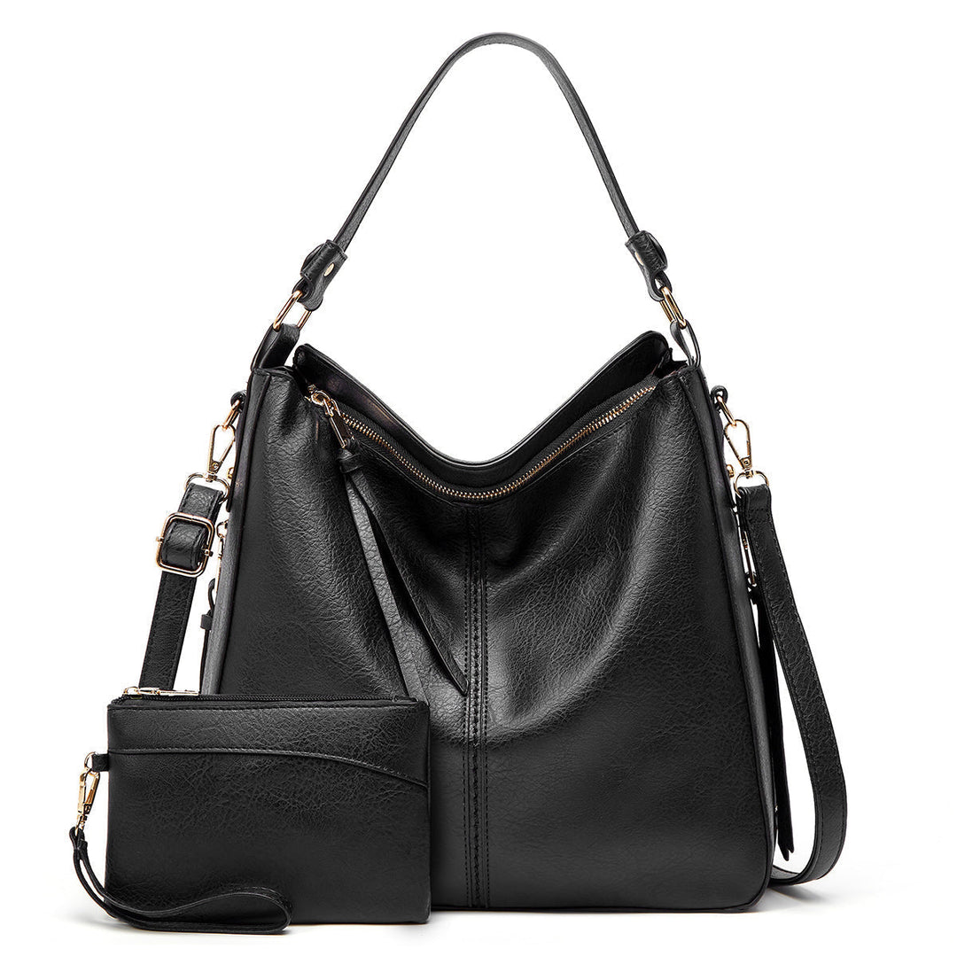 Set de bolsos femeninos: bandolera de uso diario y clutch sofisticado en piel sintética.