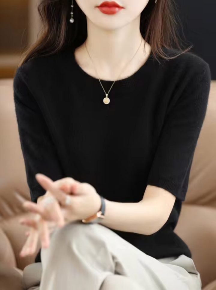 Suéter de manga corta elegante para mujer. Ideal para moda casual, oficina y estilo sofisticado.