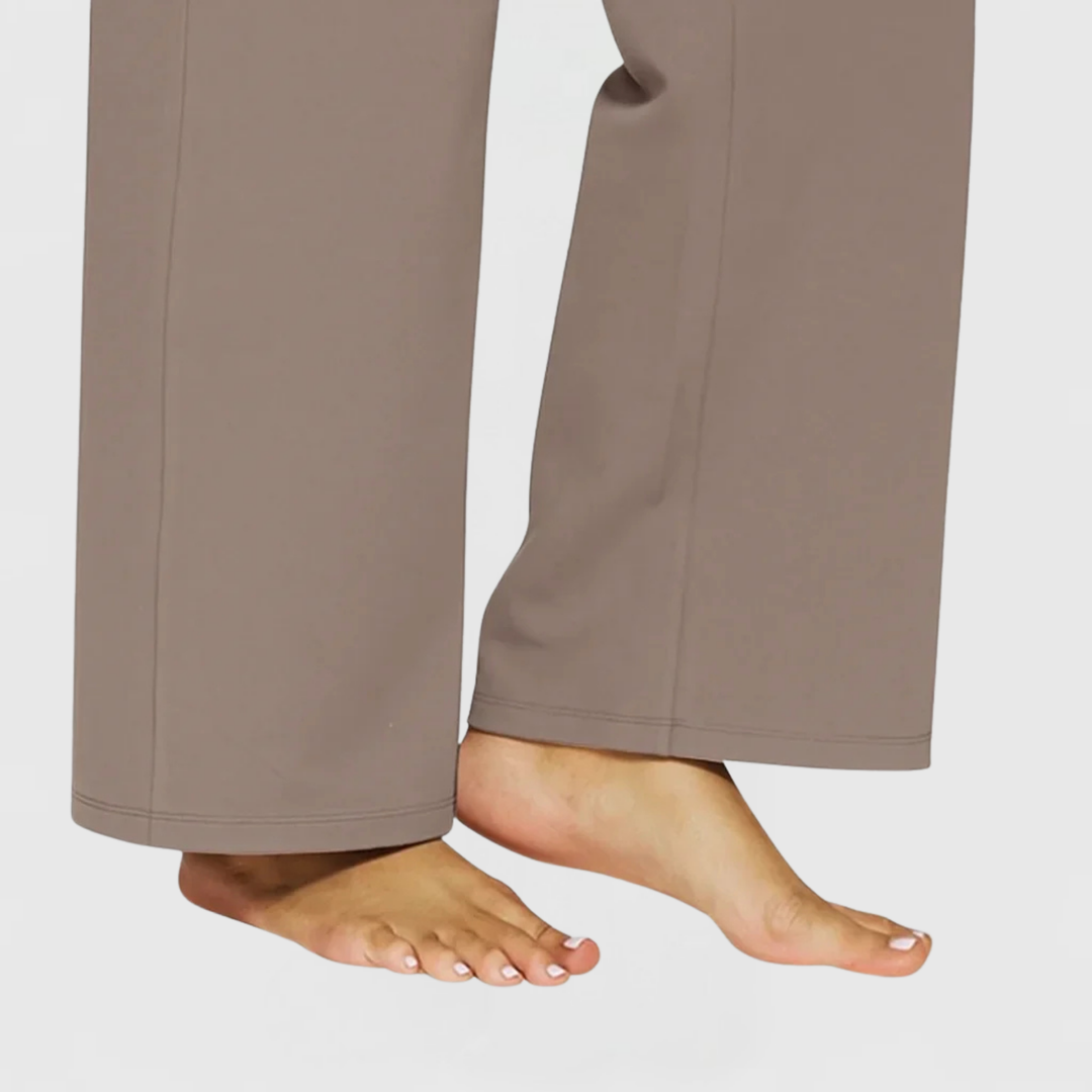 Textura de tela del pantalón elástico, suave y transpirable para la piel de mujer.
