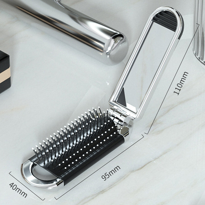 Espejo de mano y cepillo de viaje plegable, accesorio esencial para tu rutina de belleza y cuidado.