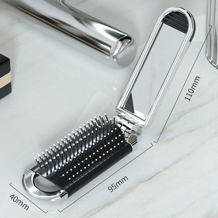 Espejo de mano y cepillo de viaje plegable, accesorio esencial para tu rutina de belleza y cuidado.