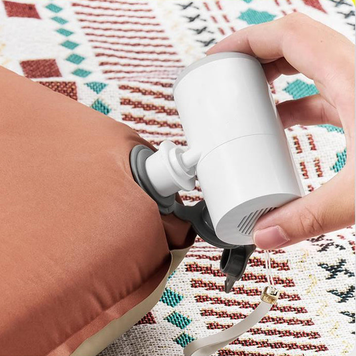 Inflador portátil de aire y desinflador con LED, útil para camping, senderismo y viajes.