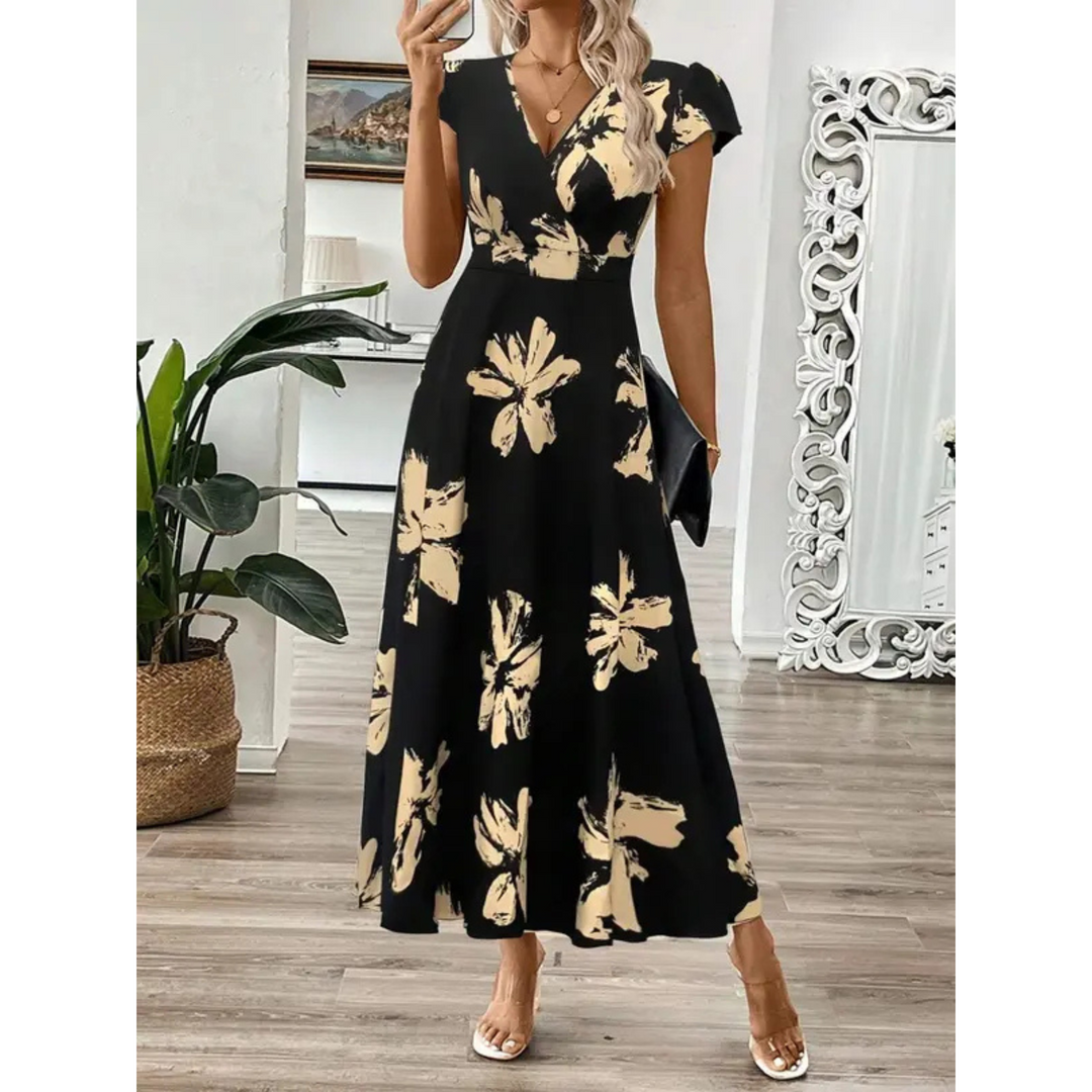 Vestido maxi floral elegante para mujer, diseño fluido y chic, ideal para verano y ocasiones especiales.