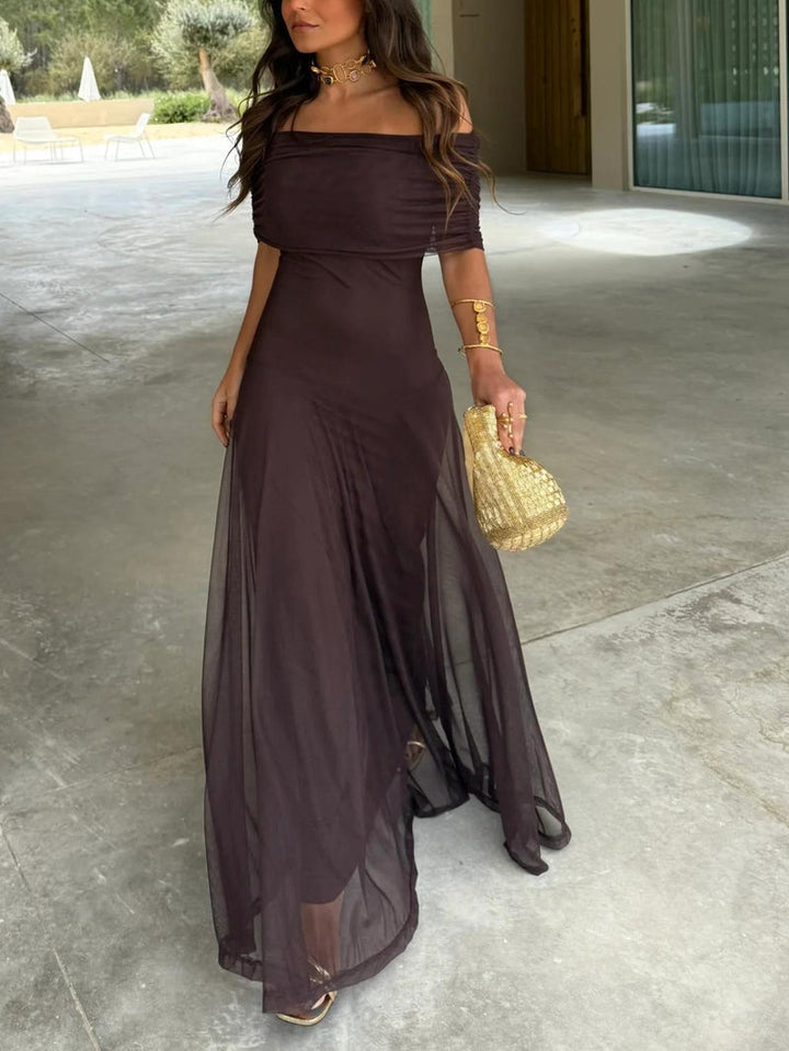 Vestido maxi elegante para mujer, silueta fluida. Ideal para fiestas y eventos de noche.