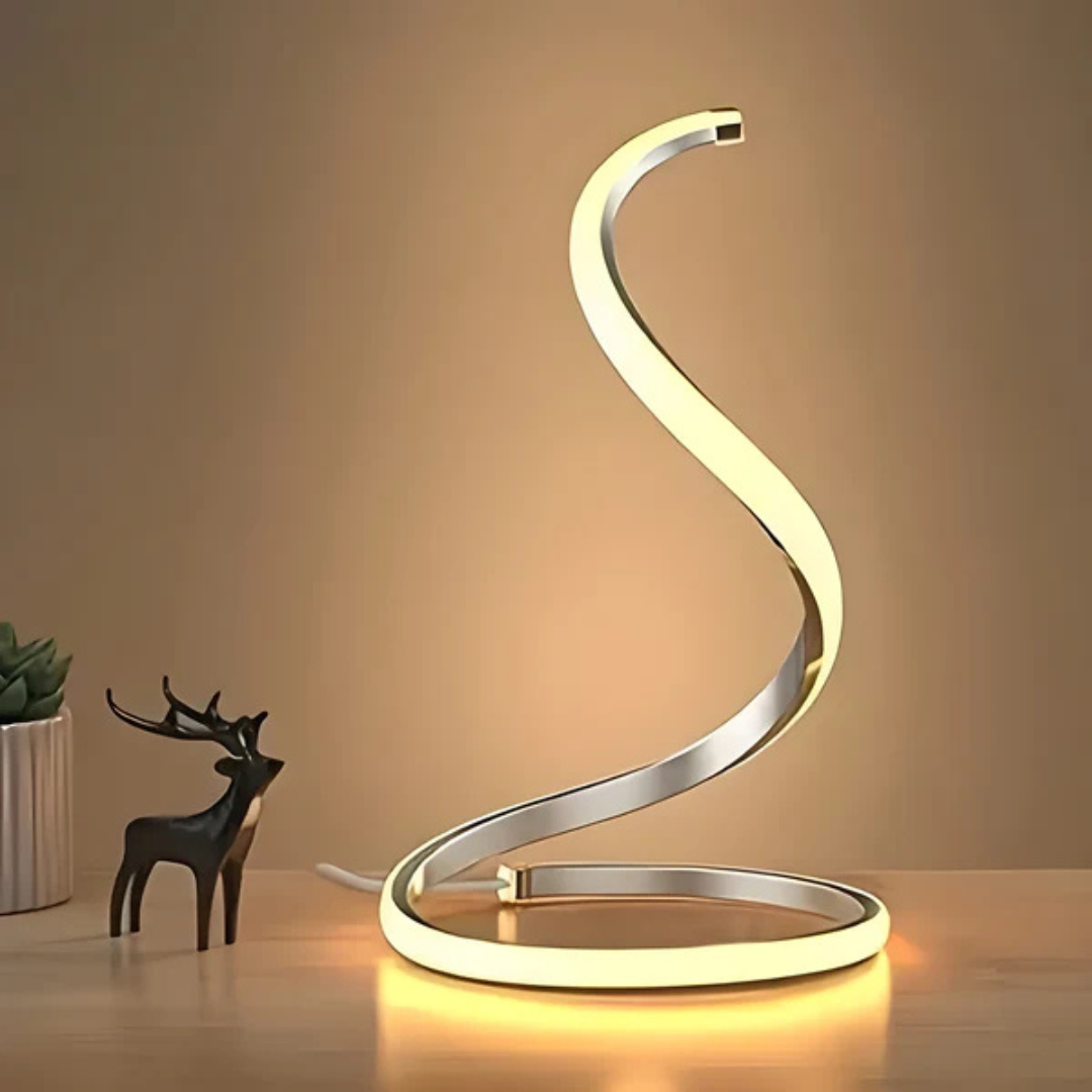 Lámpara de mesa LED decorativa con diseño moderno en forma de S. Ideal para iluminación interior, oficina o luz de ambiente.