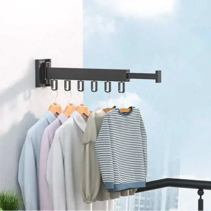 Secador de ropa plegable de pared, moderno y eficiente para organizar espacio en lavandería del hogar.