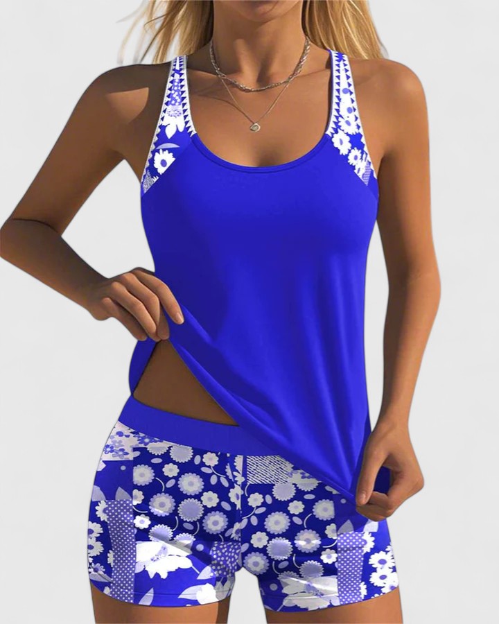 Tankini deportivo para mujer, top liso y shorts con estampado floral. Ideal piscina y playa.