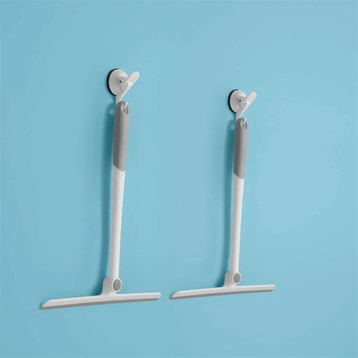 Práctico e higiénico limpiador de silicona para vidrio de ducha, espejos y superficies del baño.