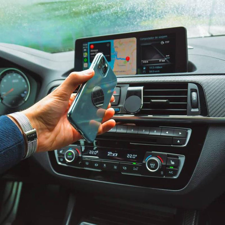 Soporte magnético universal negro para coche. Ideal para smartphone en rejilla aire, compacto y seguro.