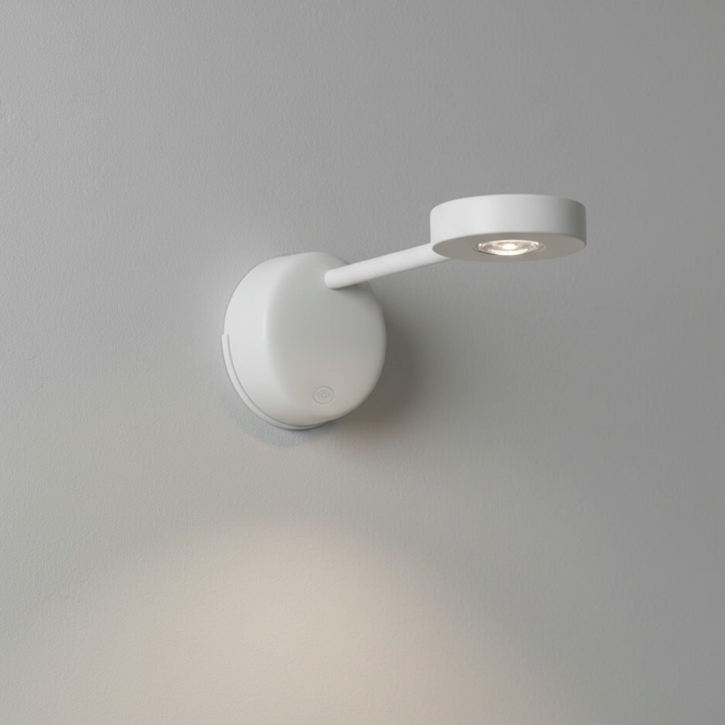 Foco LED de pared inalámbrico moderno con sensor de movimiento; ideal para iluminación interior inteligente y eficiente.