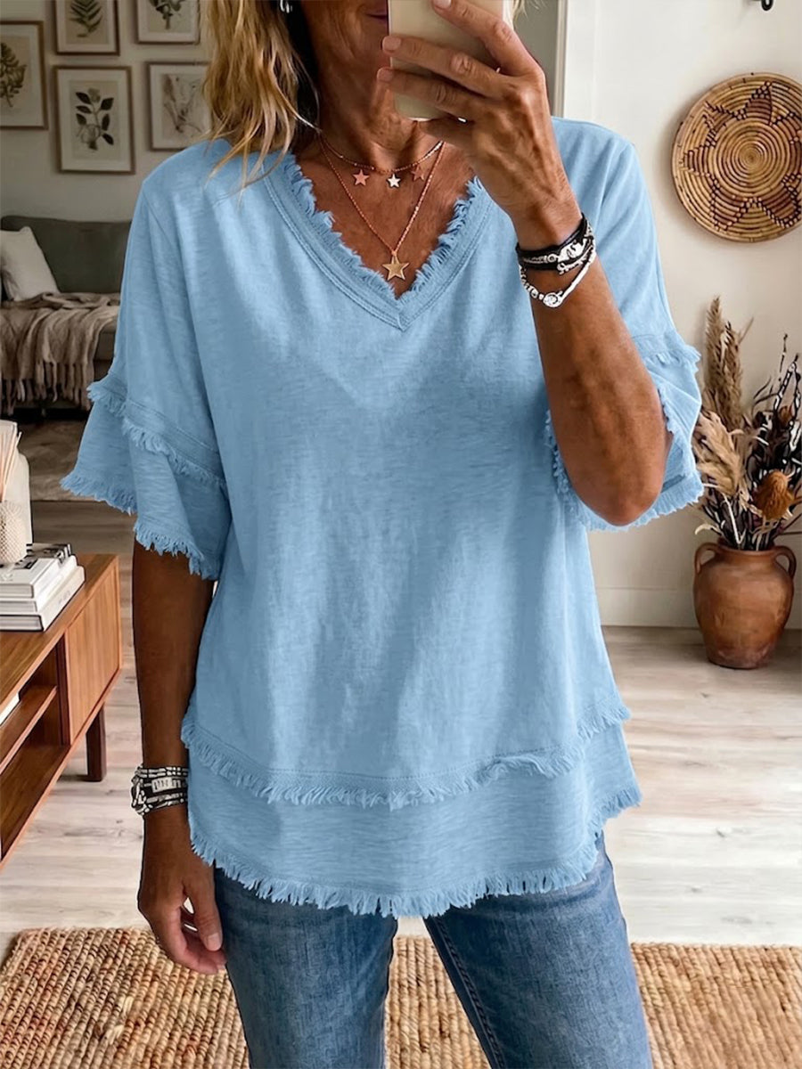 Top de verano casual para mujer con escote en V, ideal para la playa o uso diario. Tejido ligero y fresco.