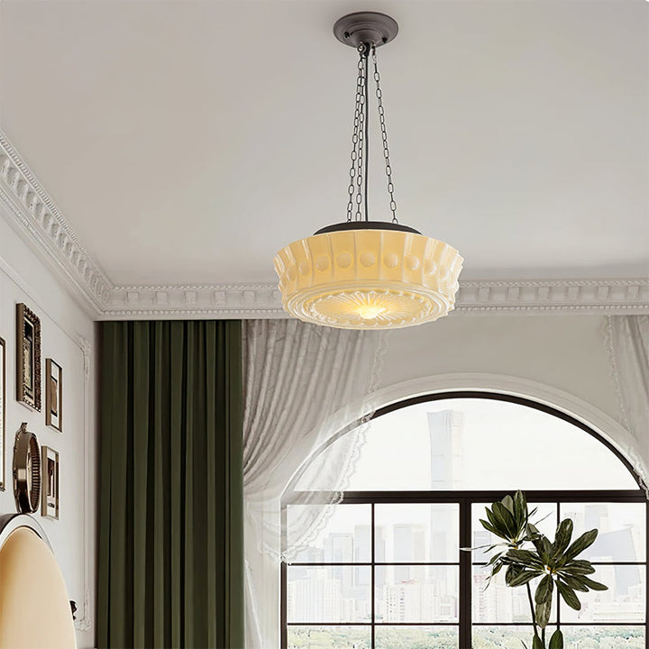 Lámpara colgante cilíndrica de hierro y vidrio para iluminación moderna de interiores.